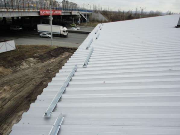 Установка снегозадержателей на крыше. Демонтаж в Новосибирске фото 4