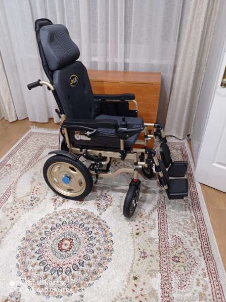Инвалидная коляска с электроприводом в фото 3