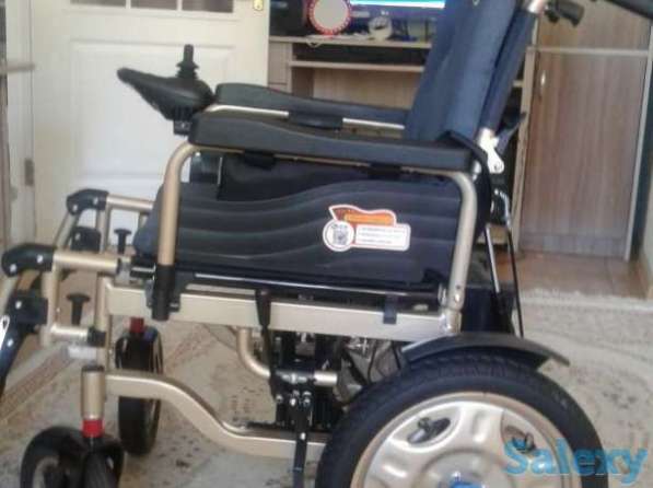Инвалидная коляска с электроприводом в фото 4