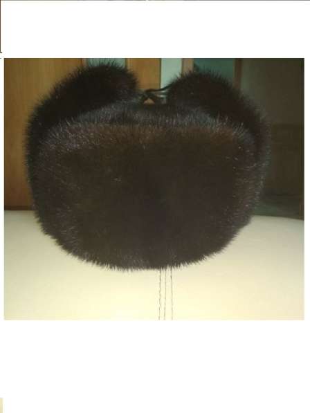 Продам шапку-ушанку норковую 57р. темно-коричневого цвета