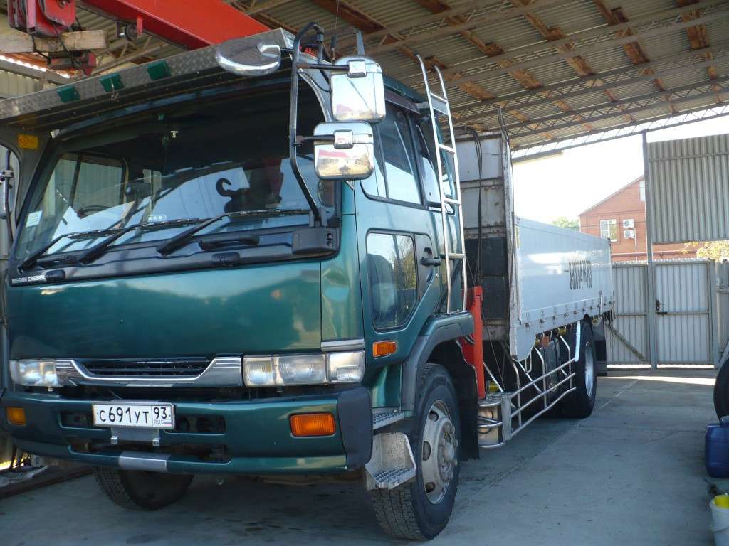 Nissan diesel. Ниссан дизель UD 1999 манипулятор. Nissan Diesel UD манипулятор. Манипулятор Nissan Diesel 10 т. Манипулятор 5 тонн Ниссан дизель UD.